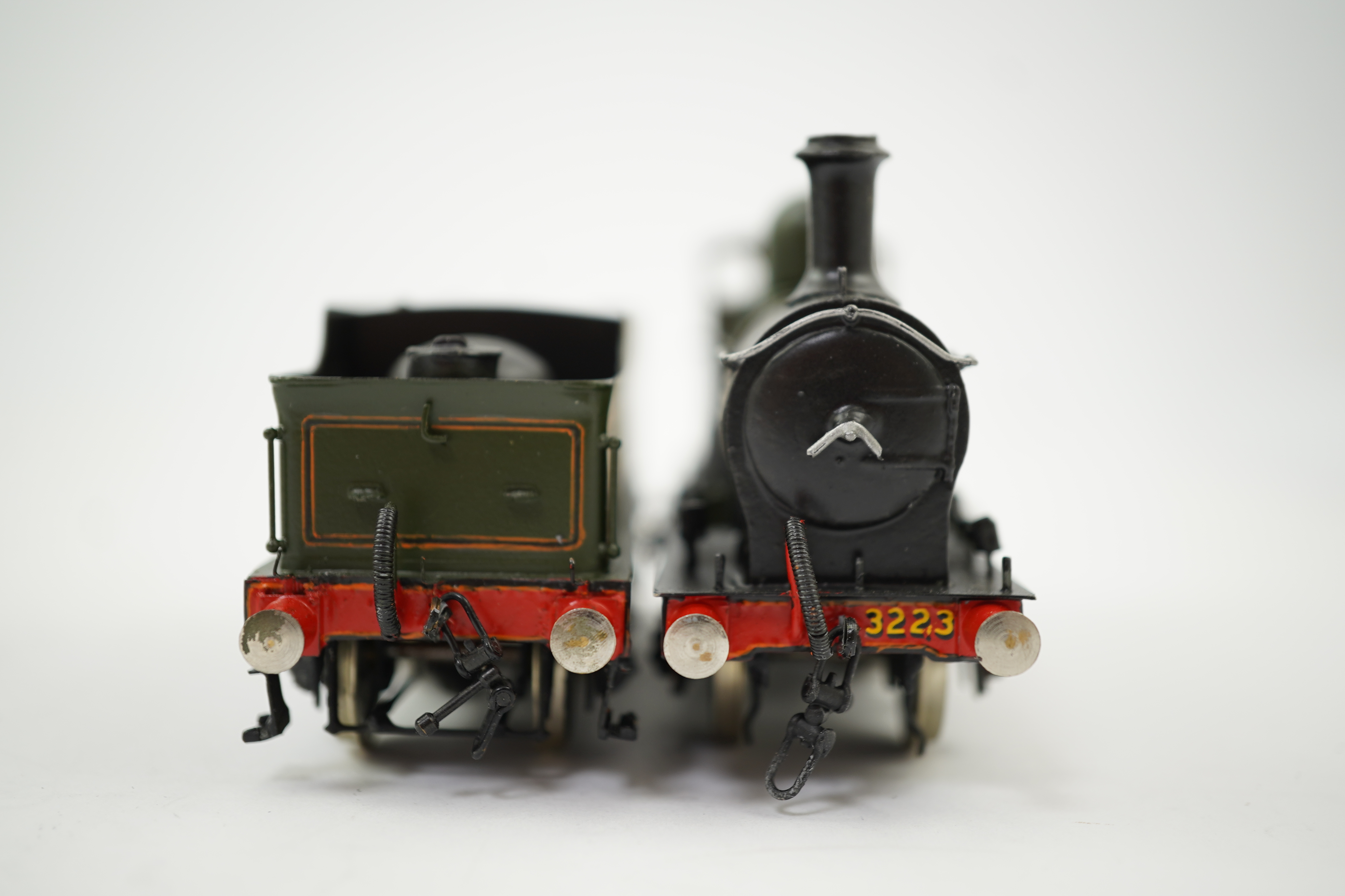 Two 00 gauge brass and white metal kit built GWR tender locomotives; a 4700 class 2-8-0, 4700, together with a Dean Barnum class 2-4-0, 3223, constructed, painted and lined to a high standard, both motored for two rail o